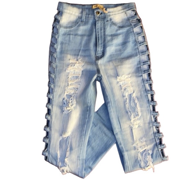 Distressed jeans with cutout side legs. - Picture 2 of 7